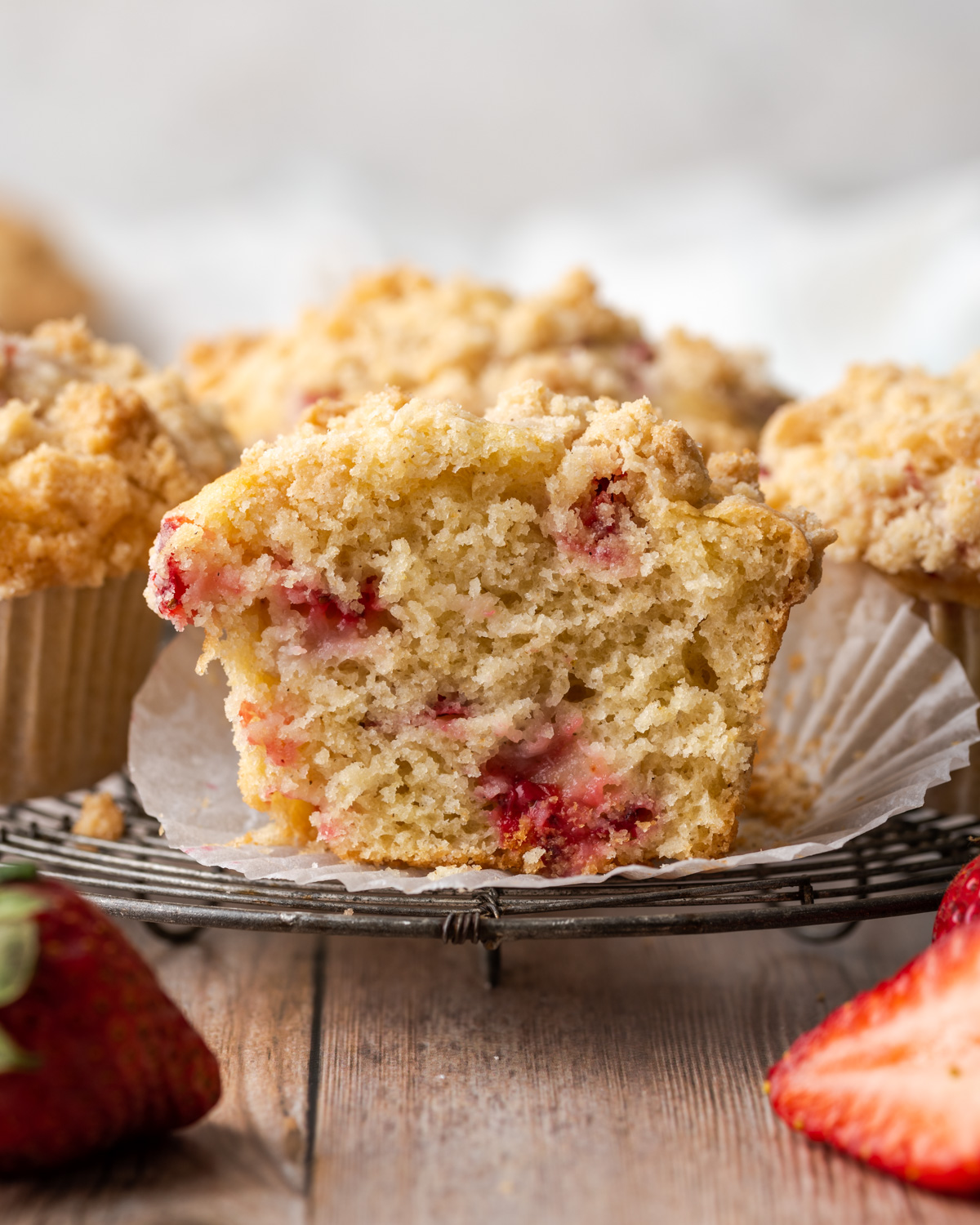 Inside of a gluten free strawberry muffin that has been sliced in half.