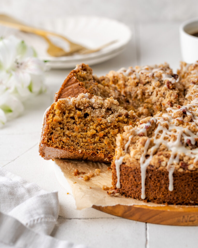 Sliced carrot cake on a table.