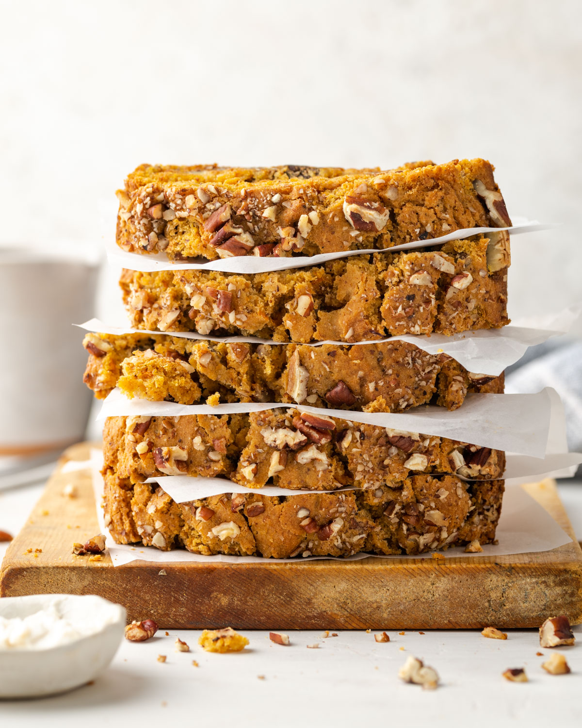 Slices of sweet potato bread on a cutting board.