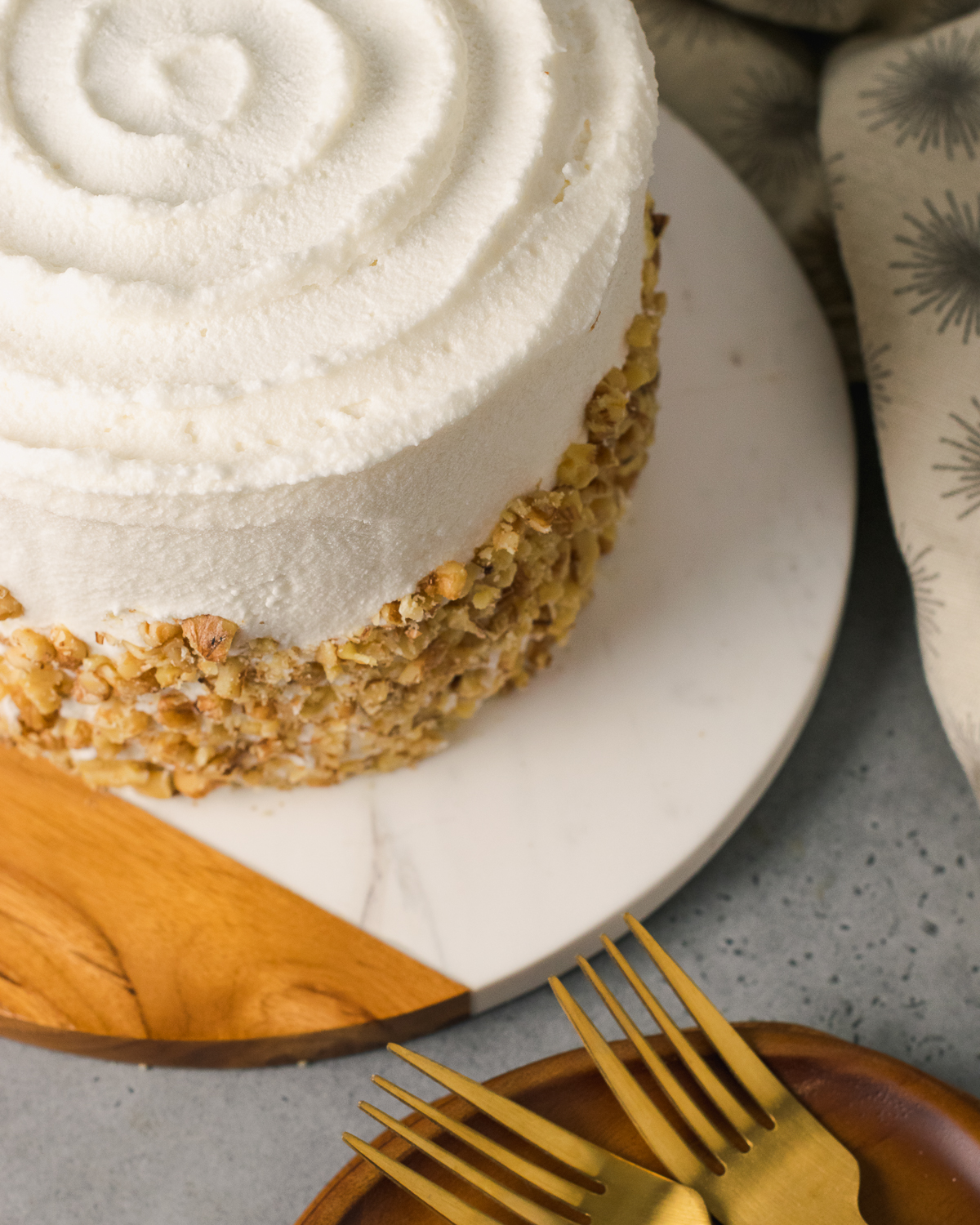 Decorated gluten free carrot cake with walnuts.
