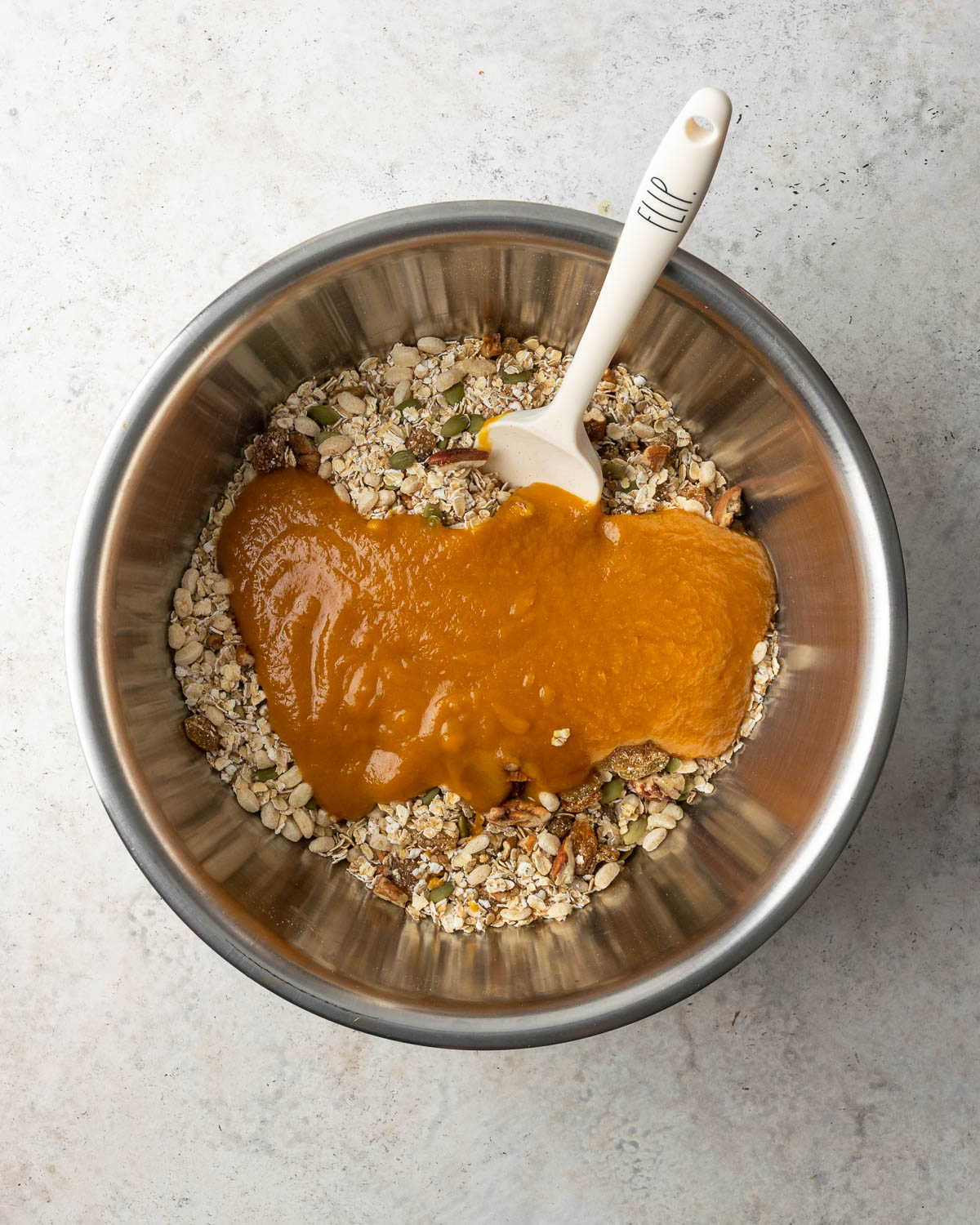 Pumpkin puree poured over dry ingredients.