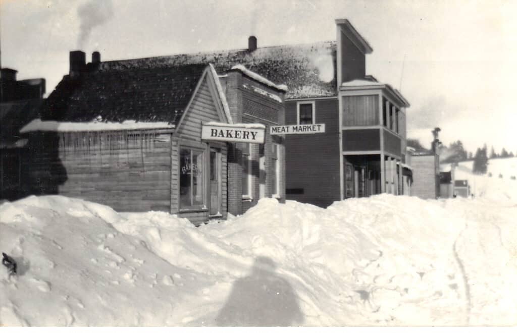 Photo of an old bakery in Idaho in a snow storm.