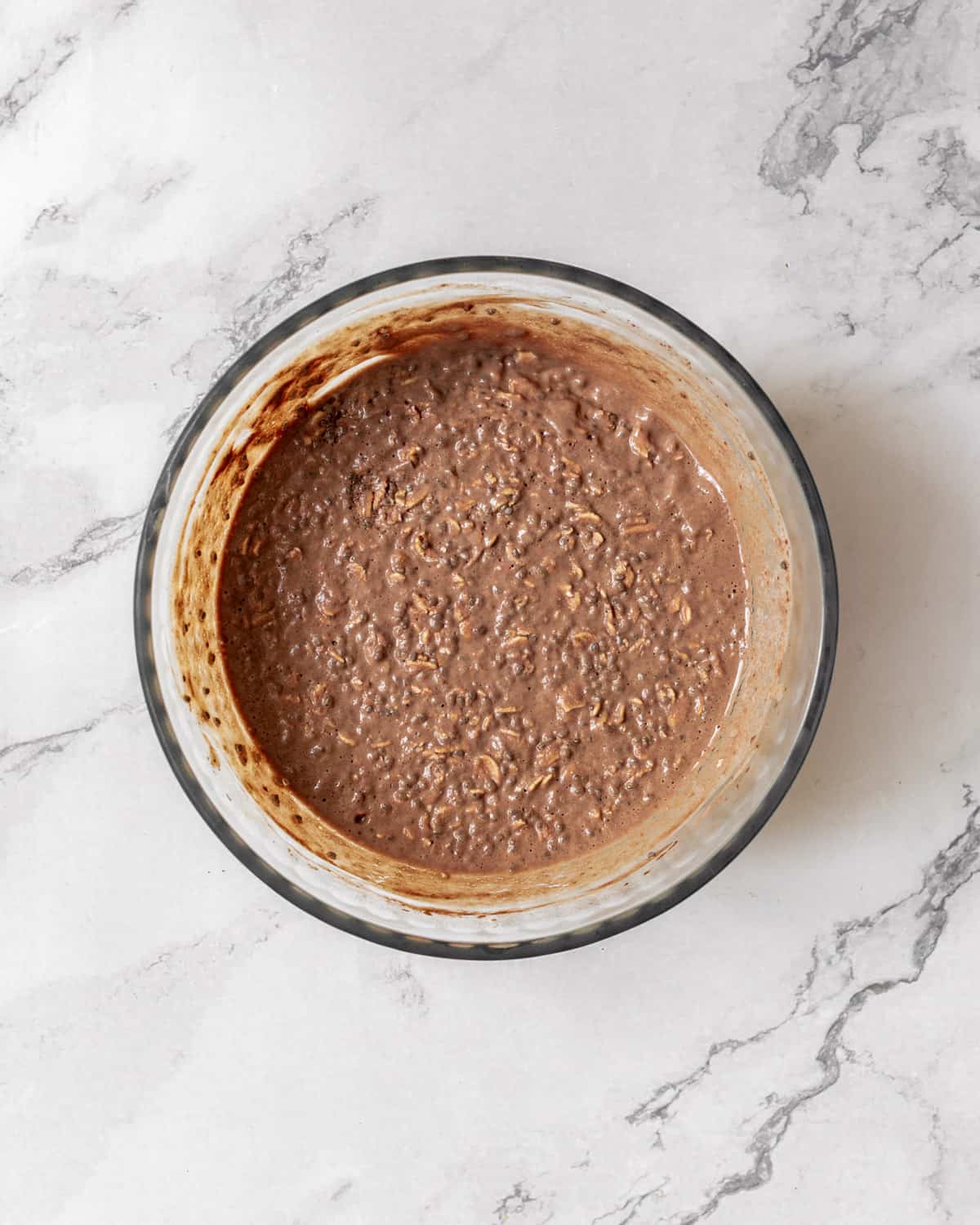 Chocolate oat mixture in a large bowl.