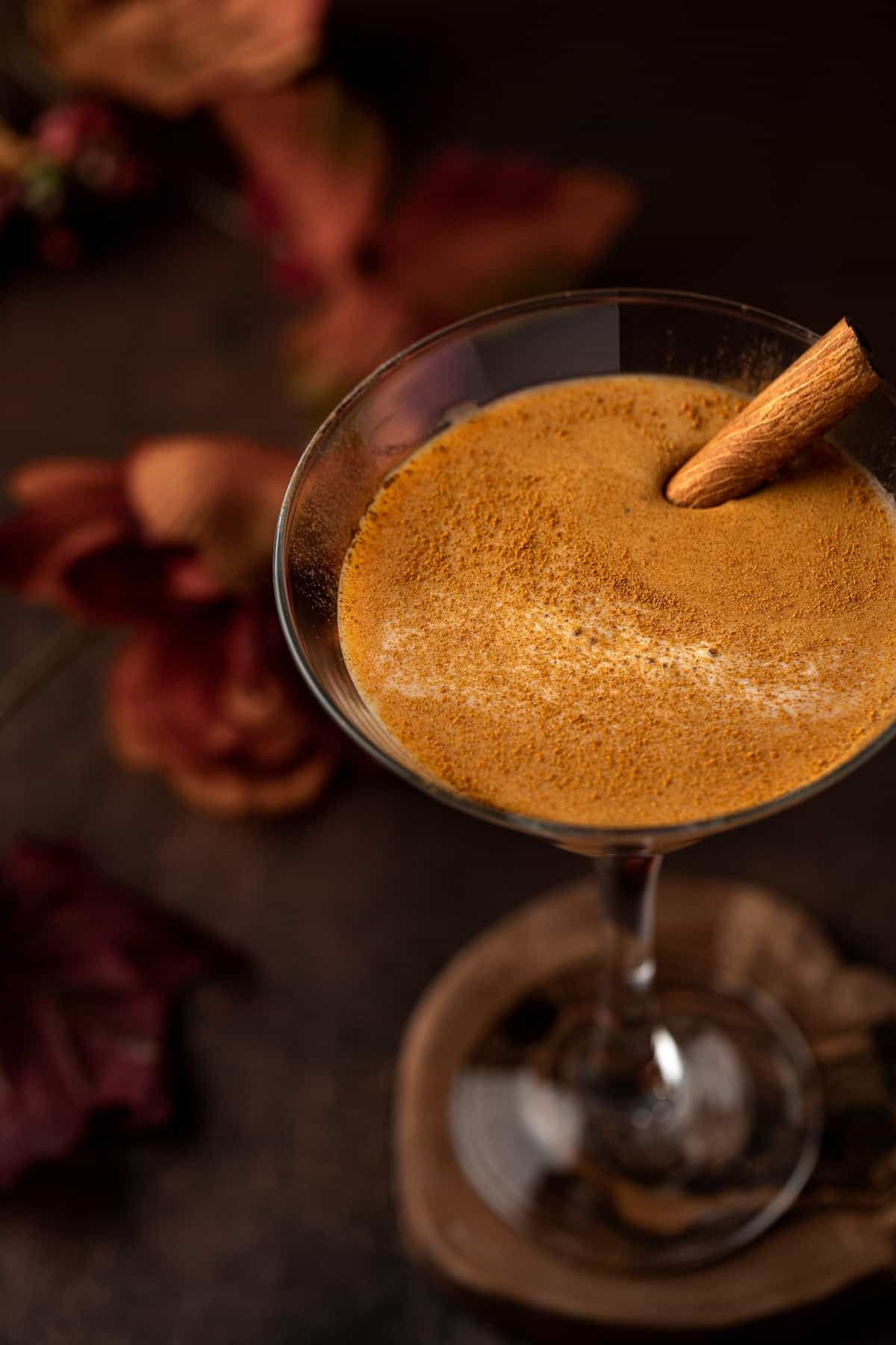 Pumpkin martini covered with a sprinkling of spices.