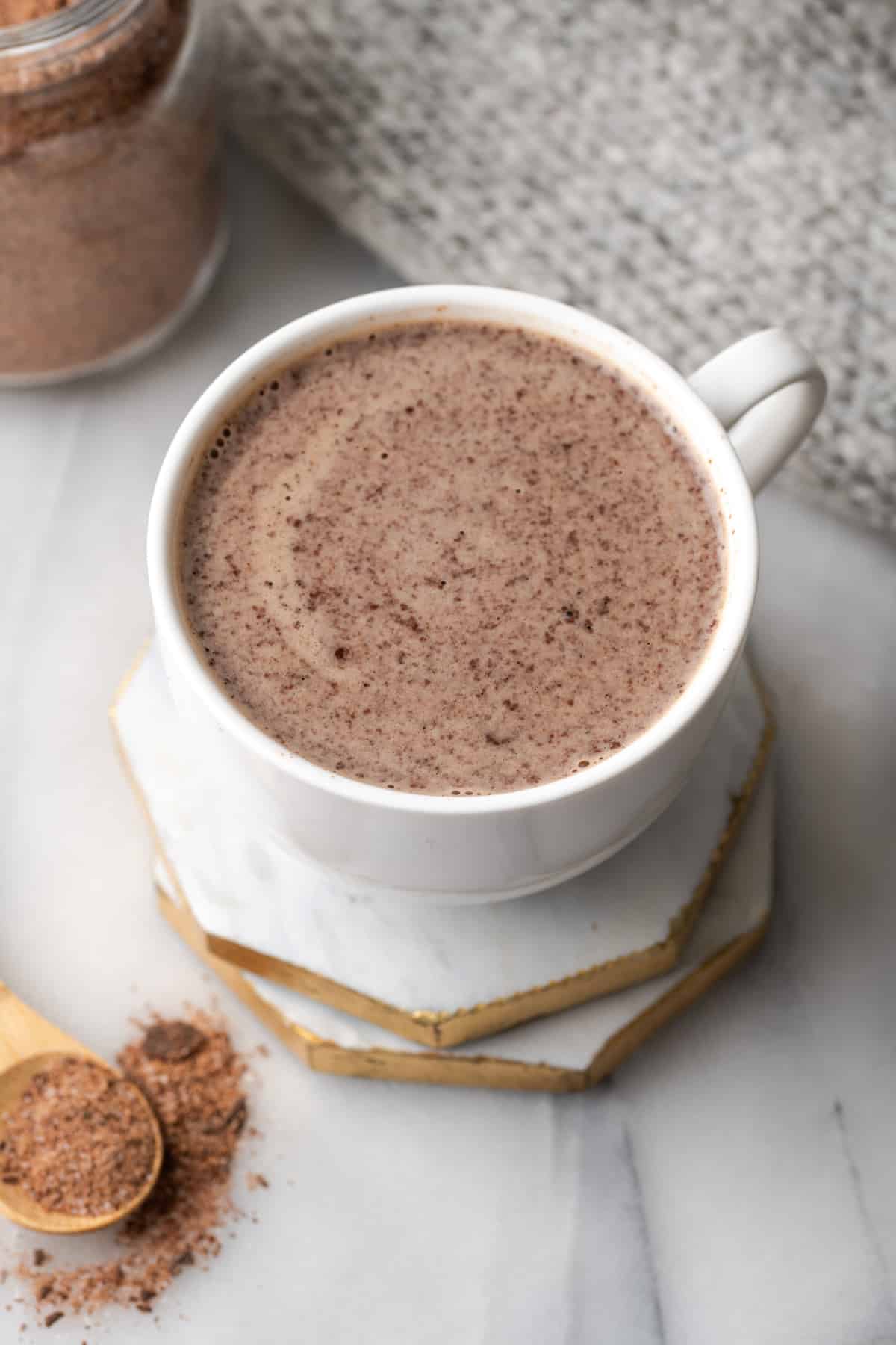A white mug filled with dairy free hot chocolate.