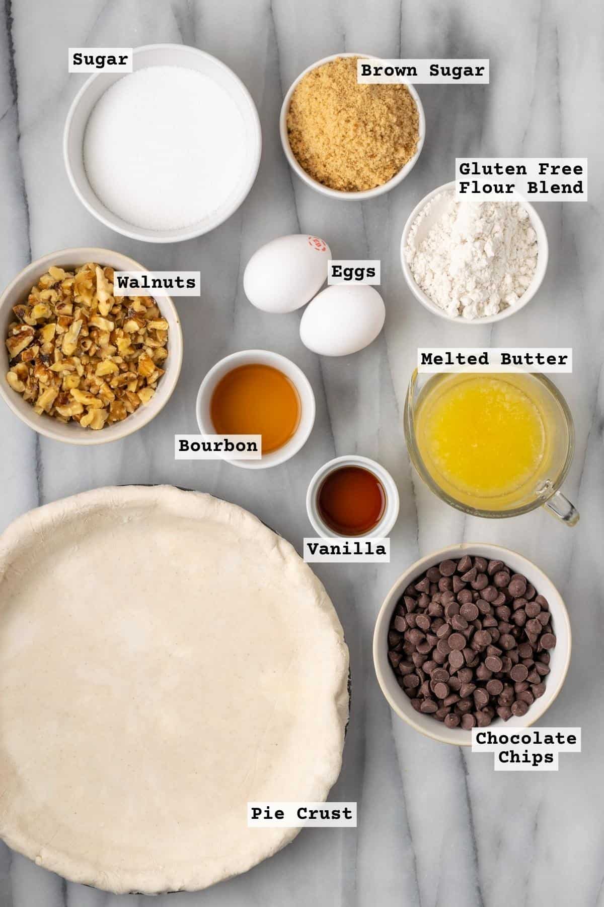 Ingredients for Kentucky derby pie on a white table.