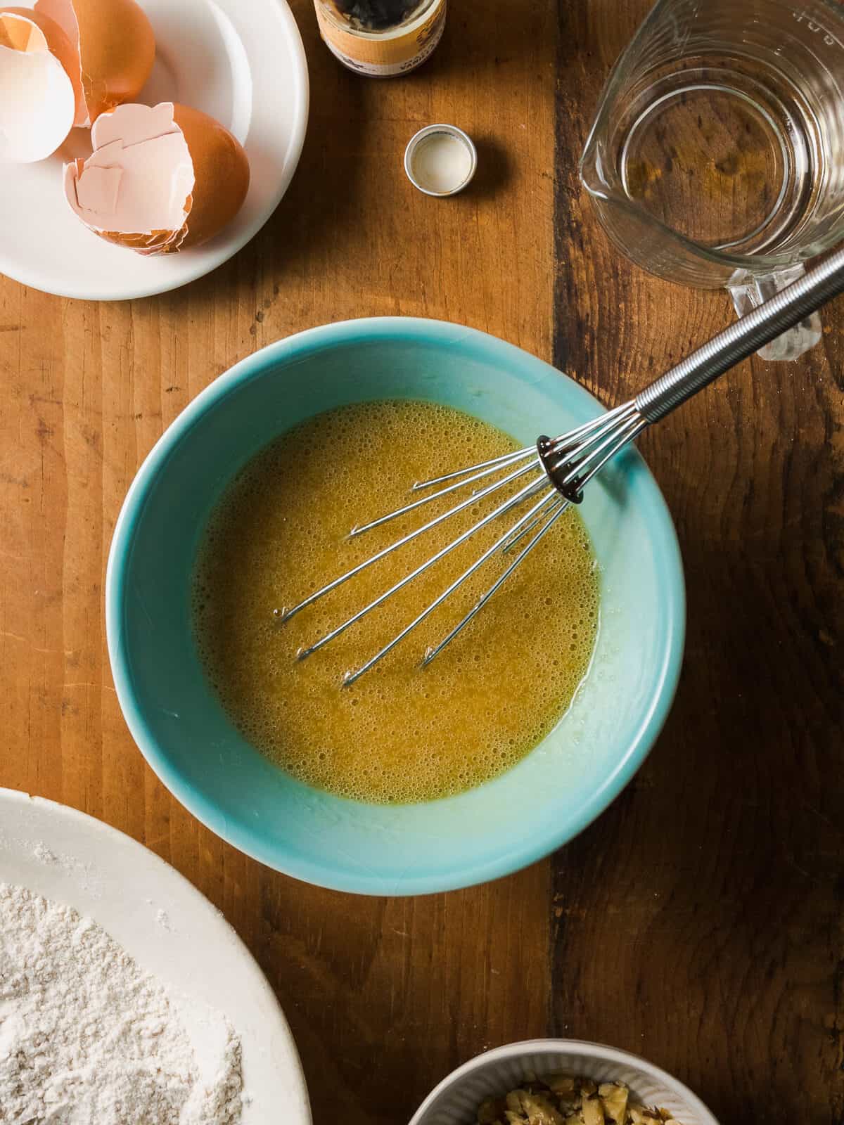 Maple syrup and vanilla mixed into beaten eggs.