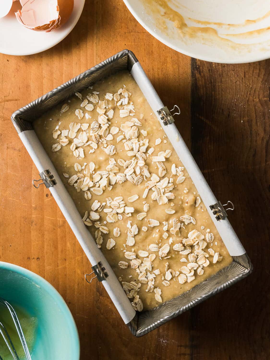 Unbaked maple banana bread batter in a metal tin. 