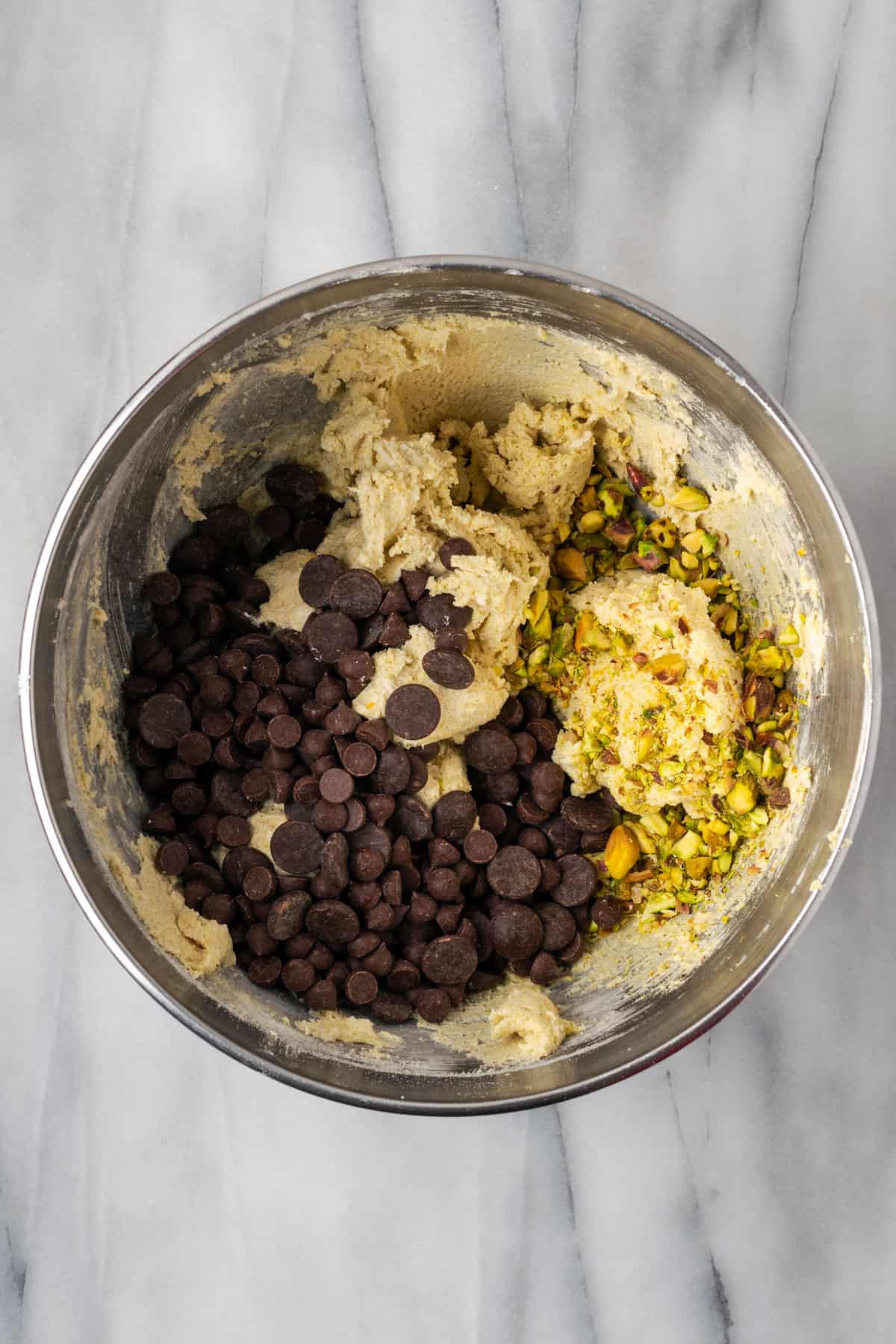 Chocolate chips and pistachios added to the mixed cookie dough.