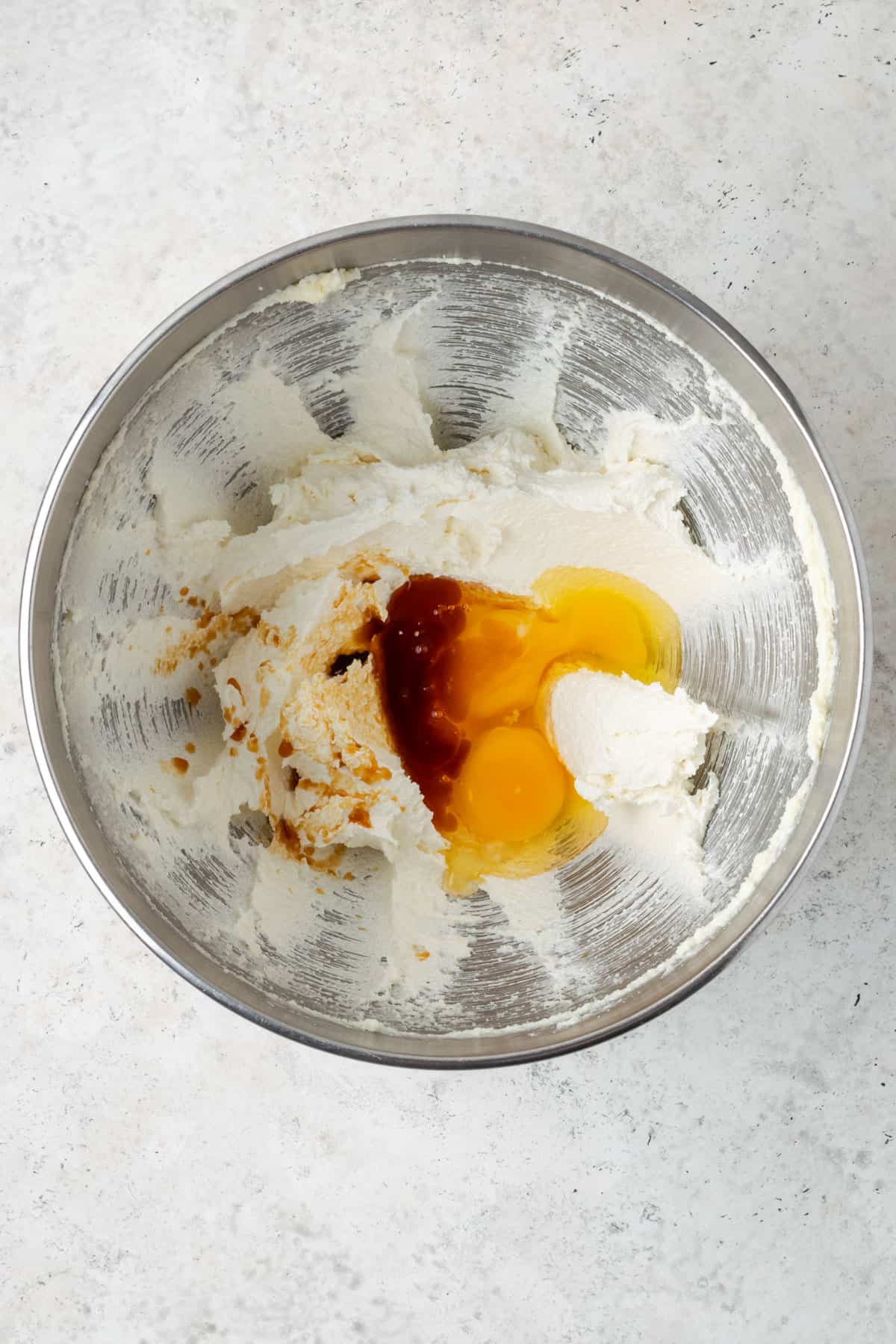 Vanilla, egg and egg yolk added to the creamed butter and sugar. 