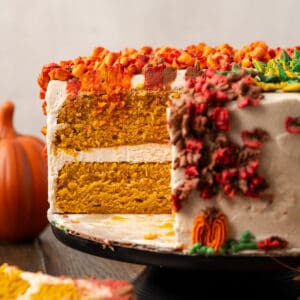 A gluten free pumpkin cake sliced so the inside layers are showing.