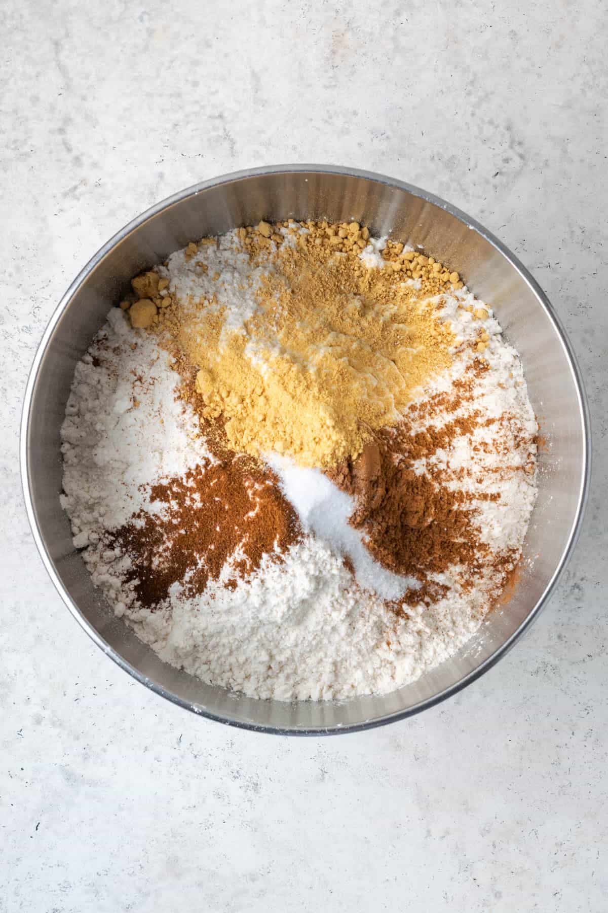 Gluten free flour, cinnamon, ginger, cloves and salt combined in a large mixing bowl. 