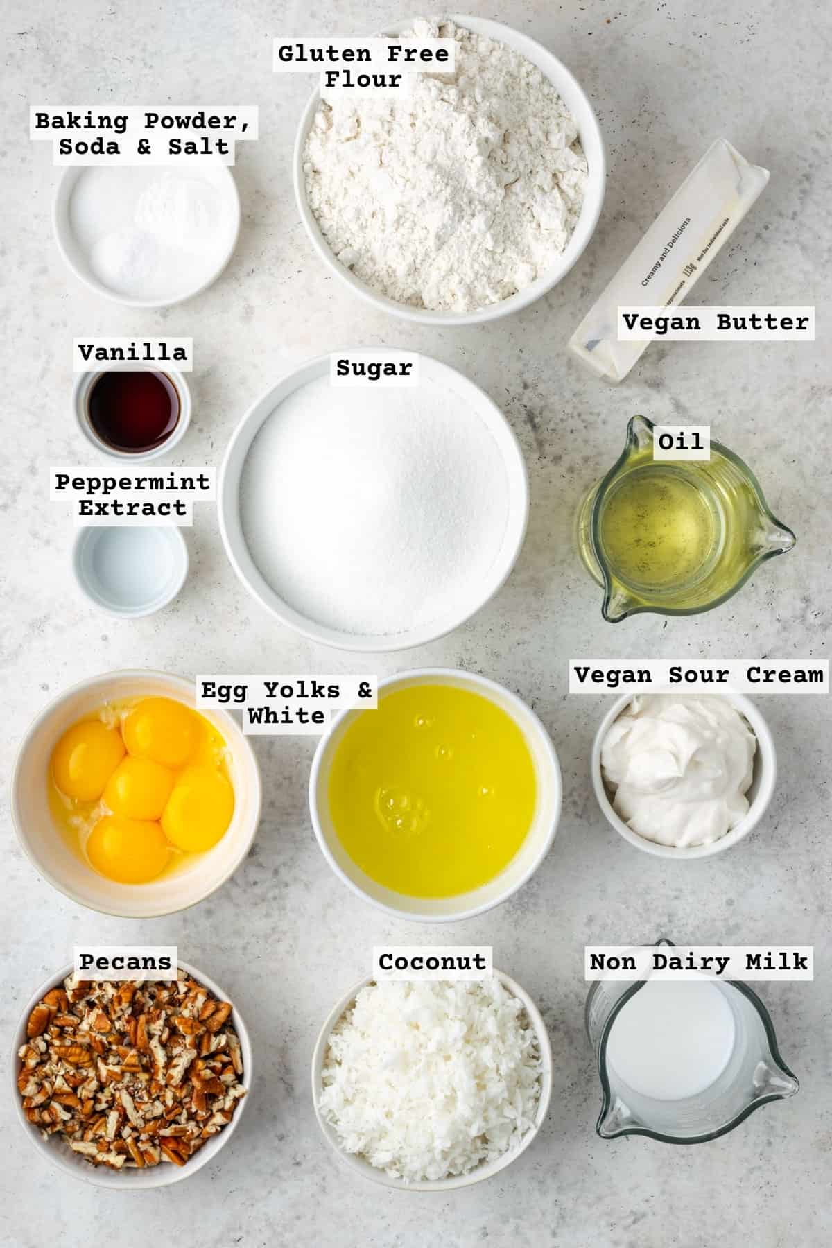 Ingredients for Italian cream cake on a white table.