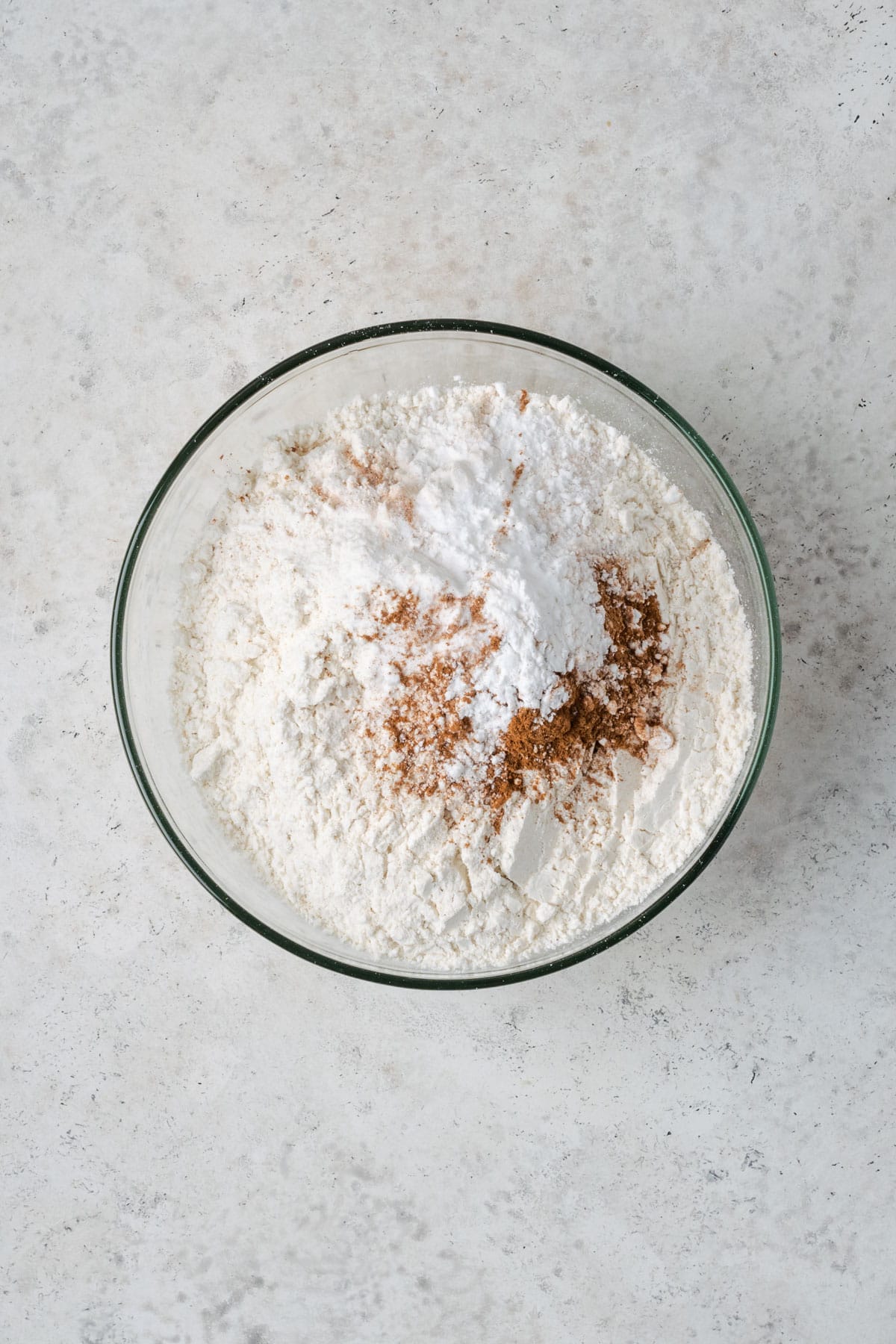 Gluten free flour, cream of tartar, baking soda, salt and cinnamon combined in a small mixing bowl. 