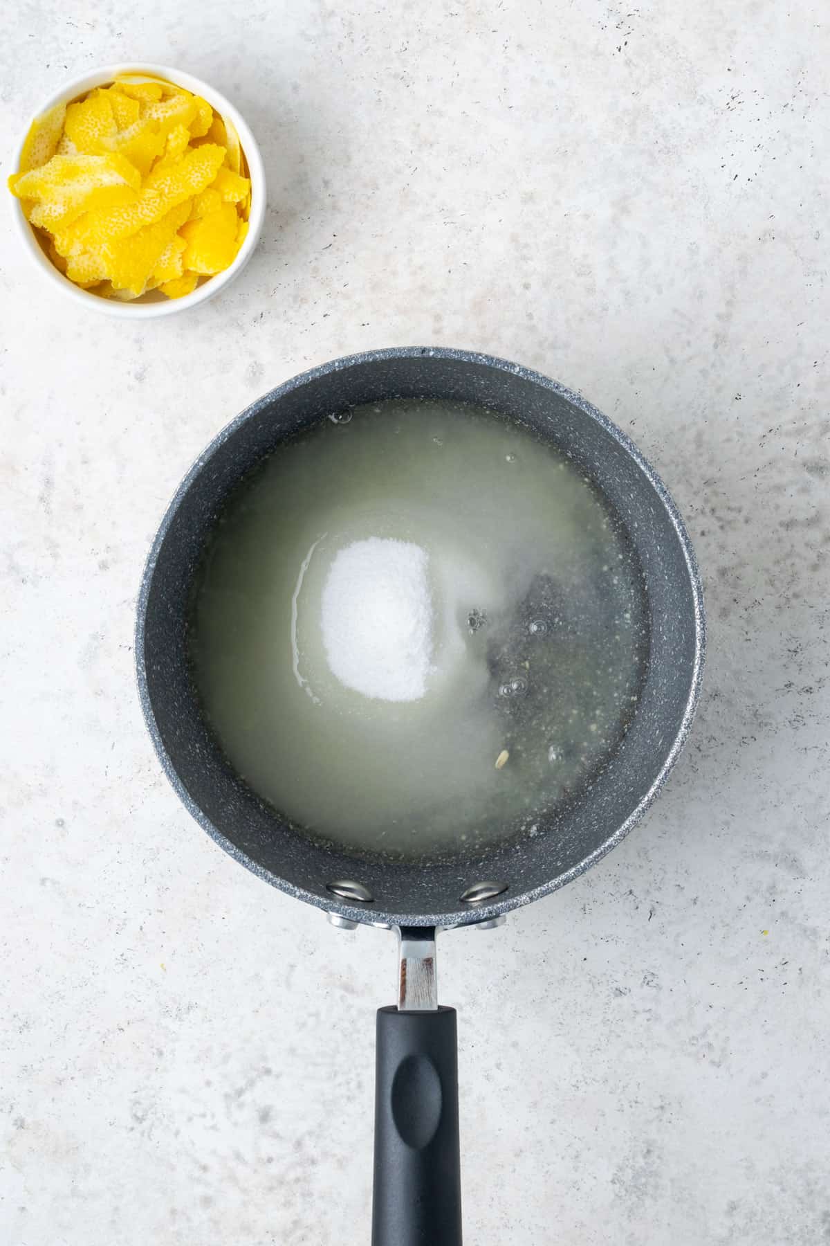 Lemon juice, water and sugar combined in a small saucepan.