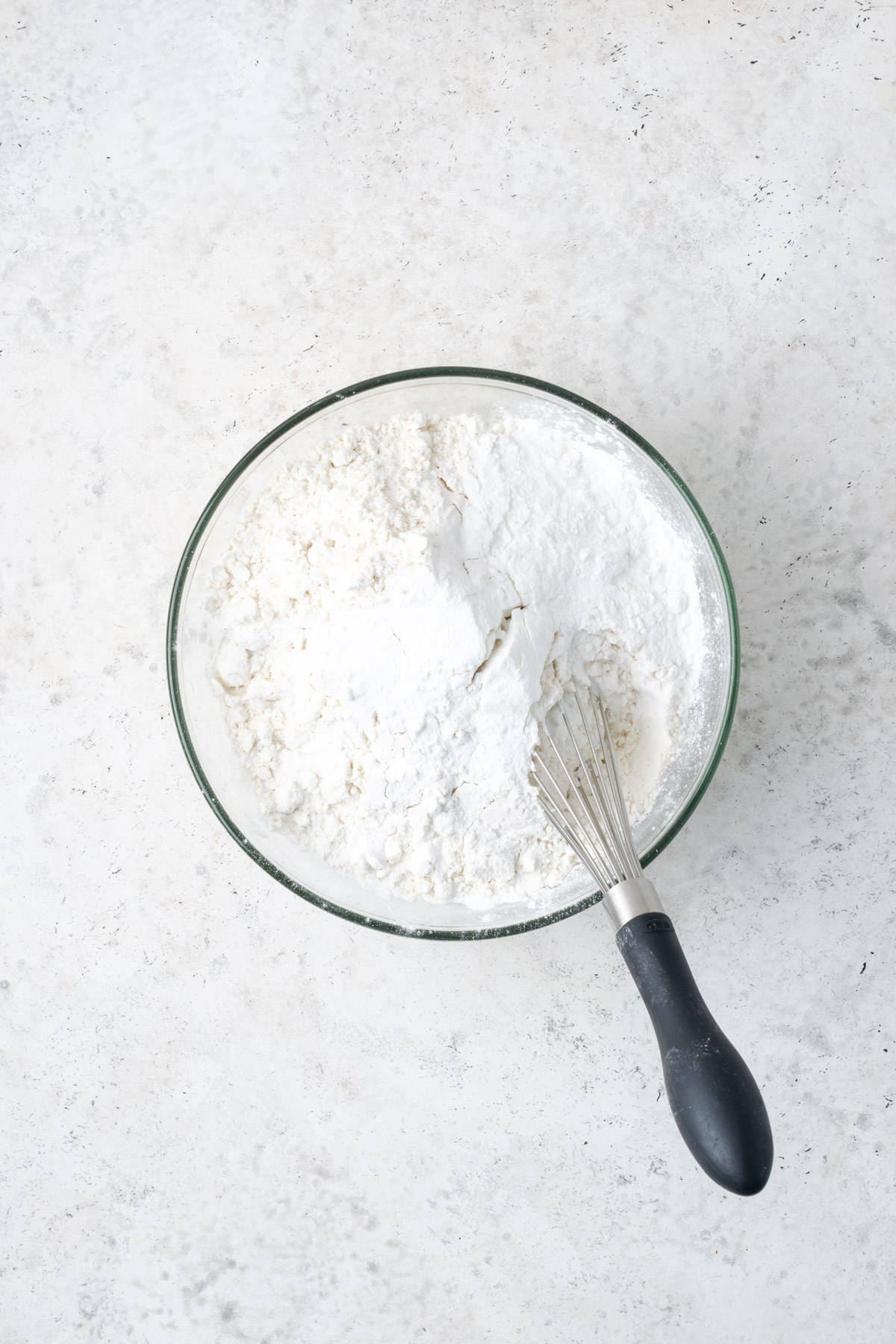 Gluten free flour, baking powder and salt combined in a small mixing bowl. 