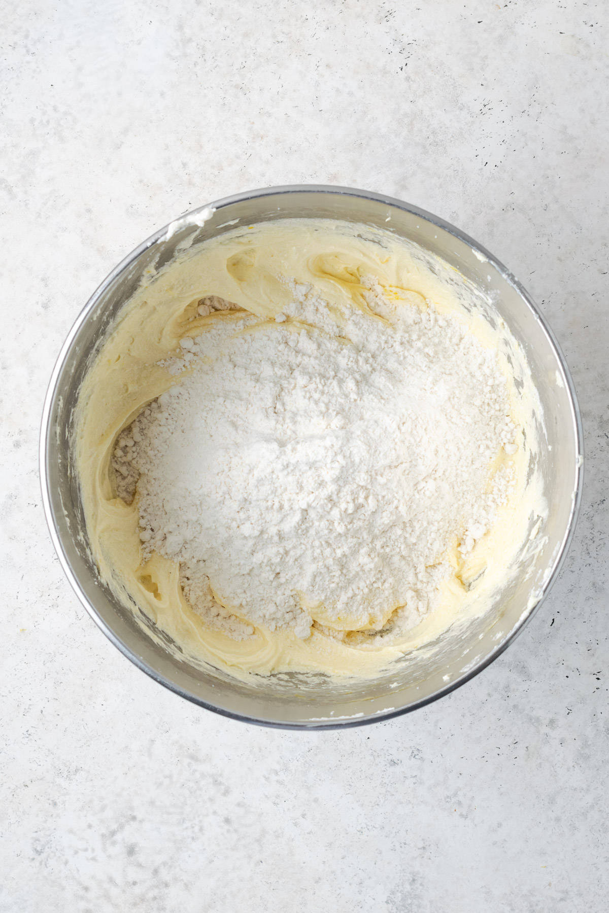 Gluten free flour added to the partially mixed lemon cake batter.