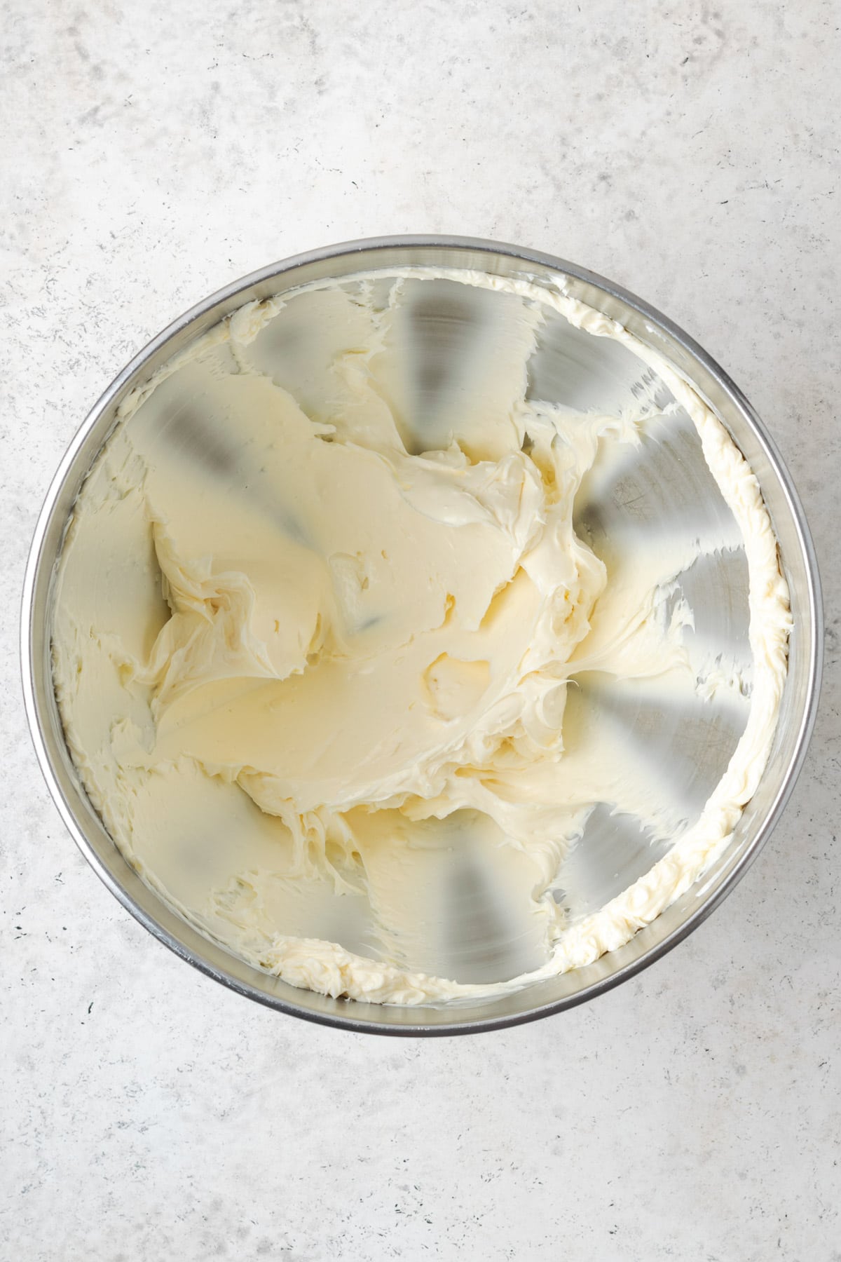 Butter creamed until smooth in a large mixing bowl.