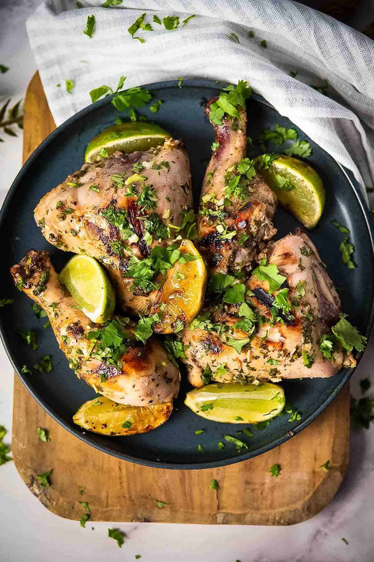Cilantro lime chicken on a black serving plate.