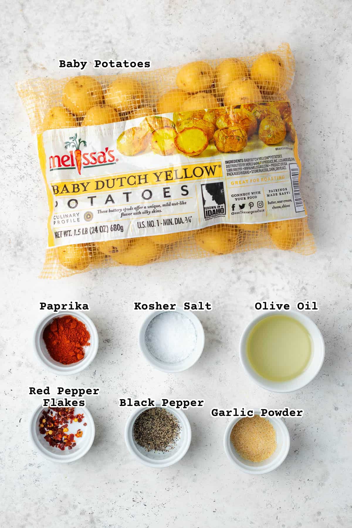Ingredients for air fryer baby potatoes on a countertop.