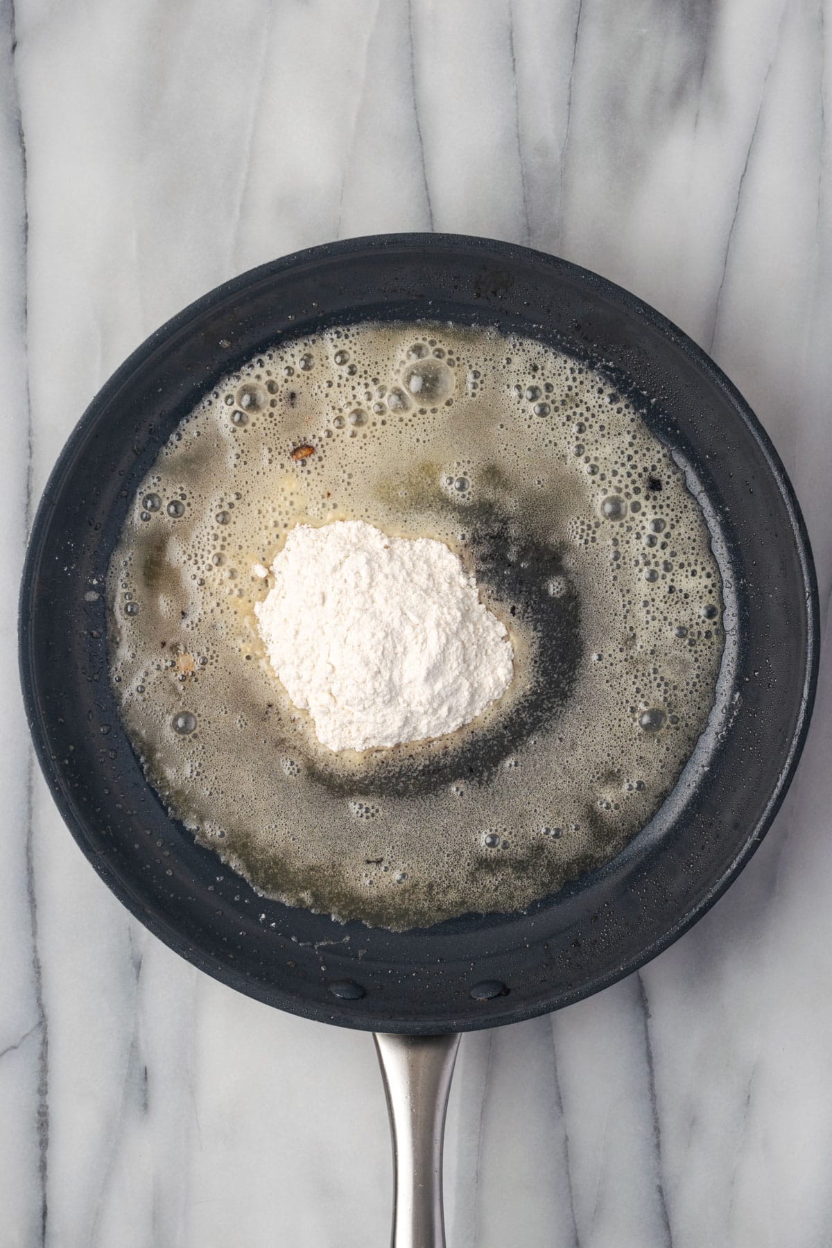 Melted butter and flour in a large skillet. 