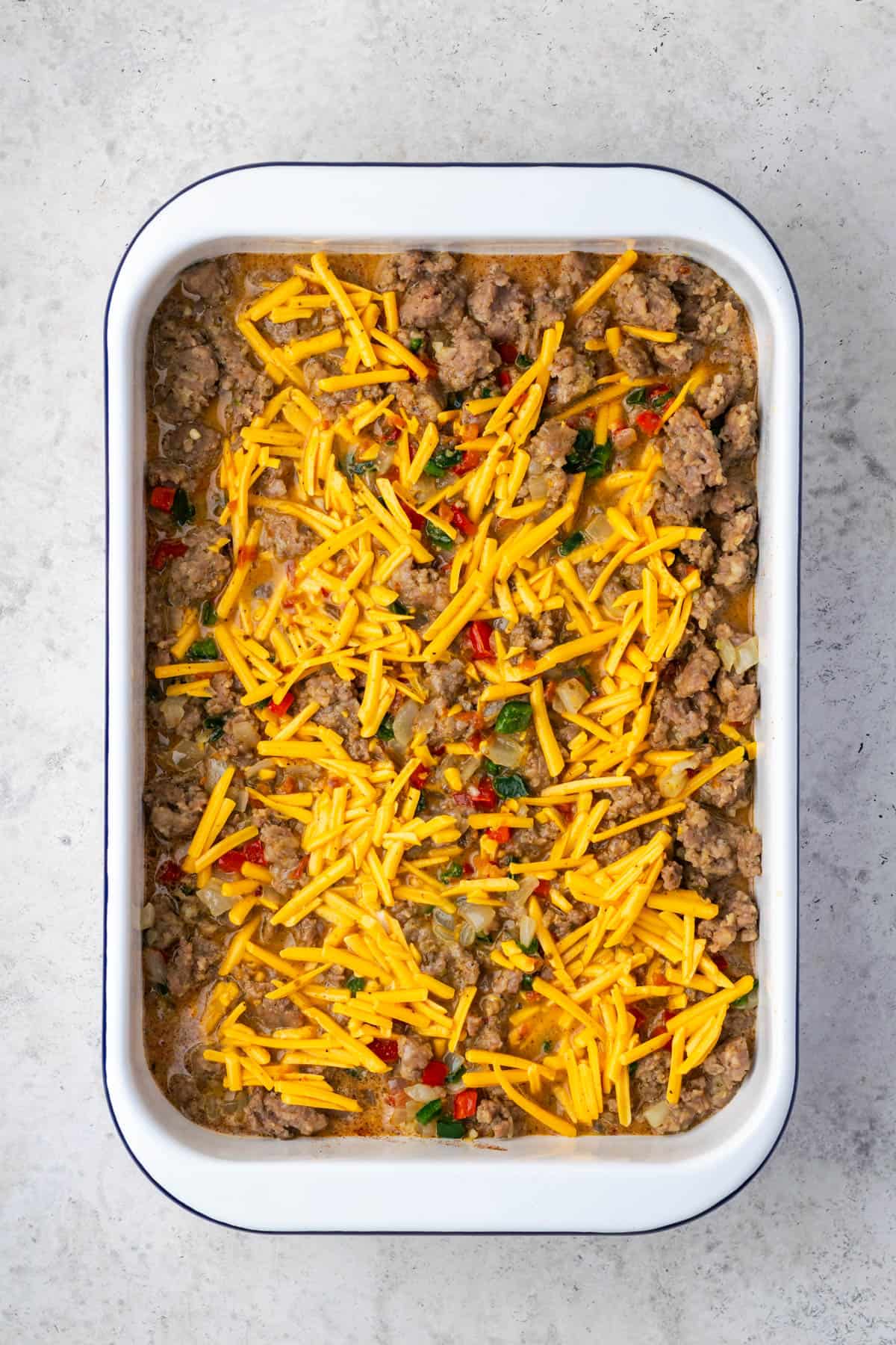 Assembled breakfast casserole ready to bake.