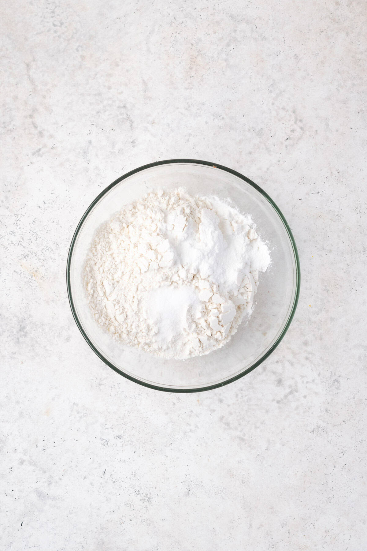 Gluten free flour, baking powder and salt combined in a small mixing bowl.