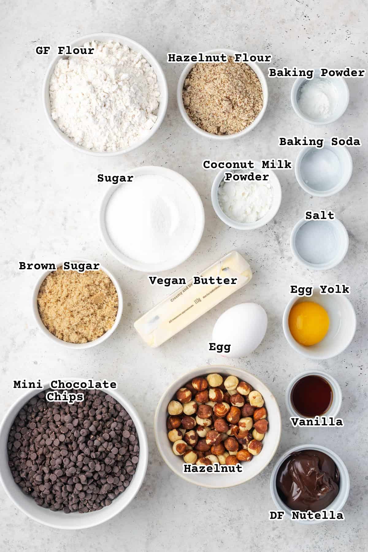 Ingredients for Nutella stuffed cookies sitting on a countertop. 