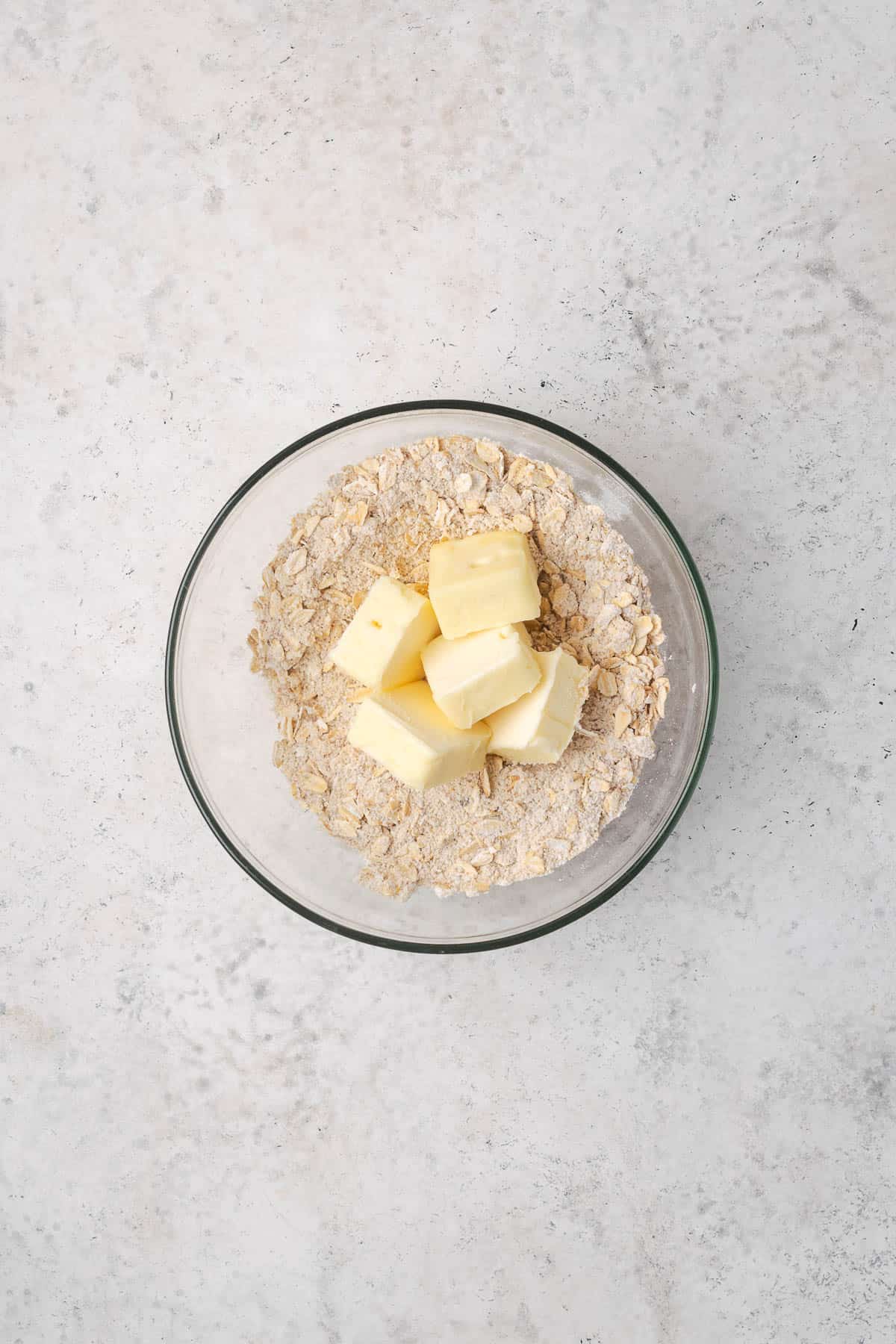 Oats, flour, brown sugar, salt and butter combined in a small bowl.