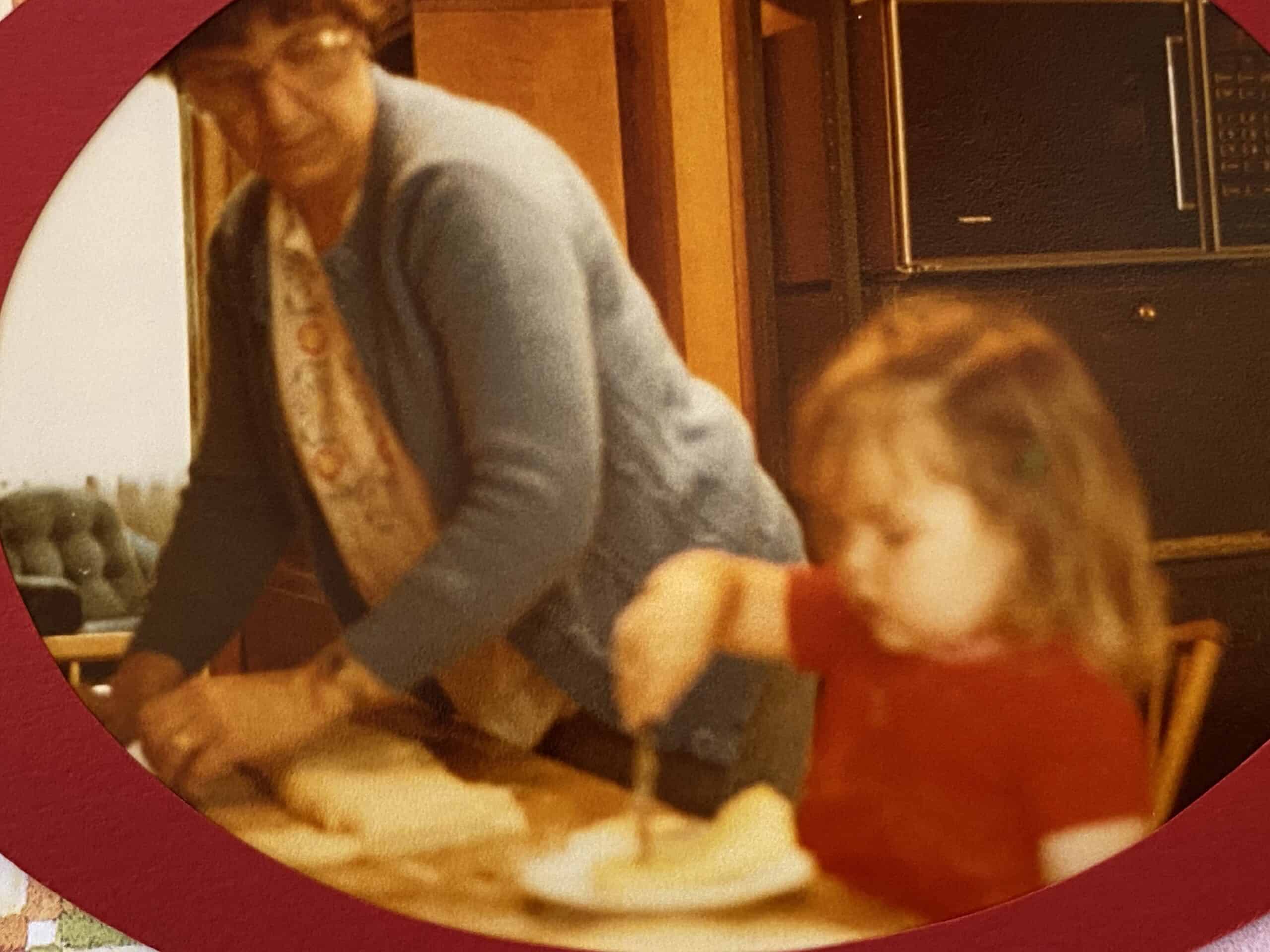 Grandma and Tiffany making butter rolls at the kitchen table.