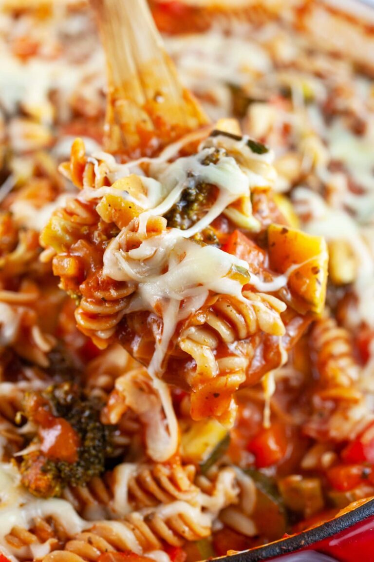 Gluten free fusilli pasta in a tomato sauce with mixed vegetables. 