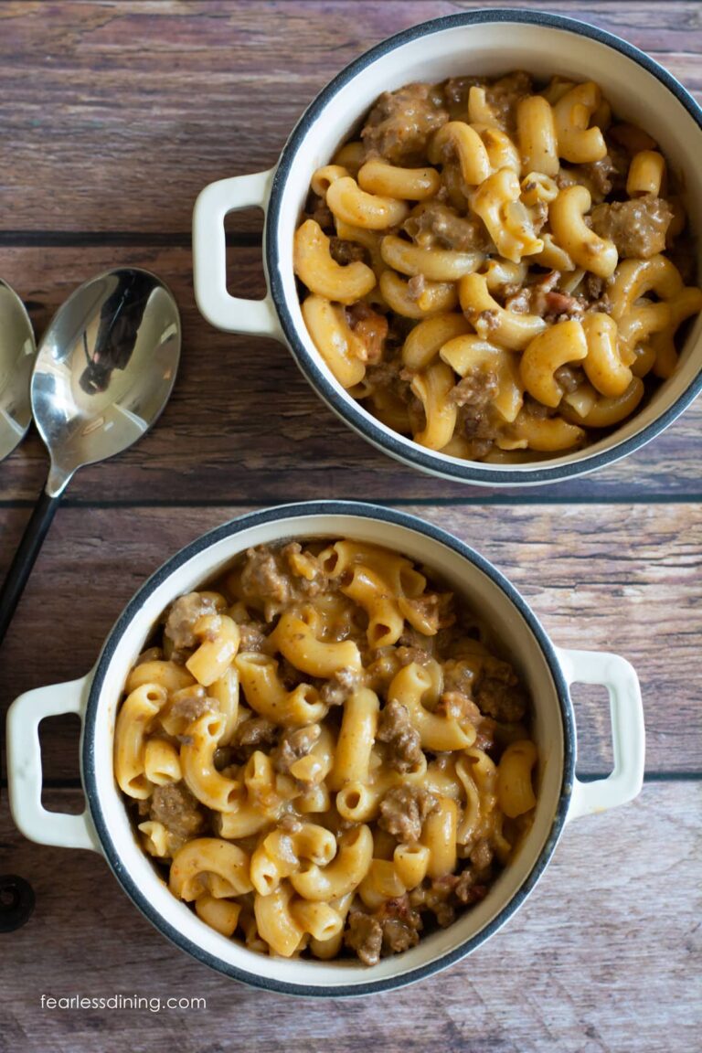 Two small dishes of gluten free hamburger helper made with elbow macaroni.