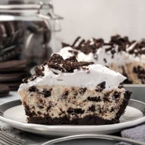 A slice of Oreo pie served on a small dessert plate.
