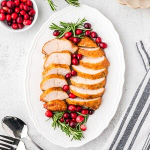 Slices of turkey tenderloin on a serving platter.