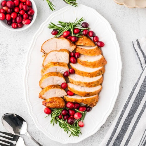 Slices of turkey tenderloin on a serving platter.