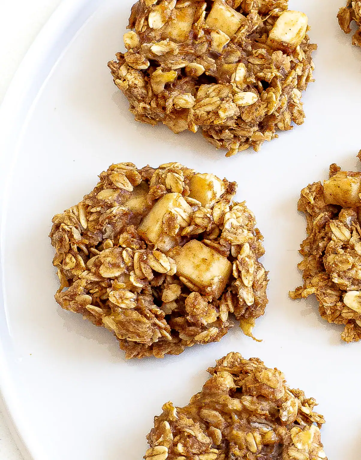 Oatmeal apple cookies sitting on a serving tray.