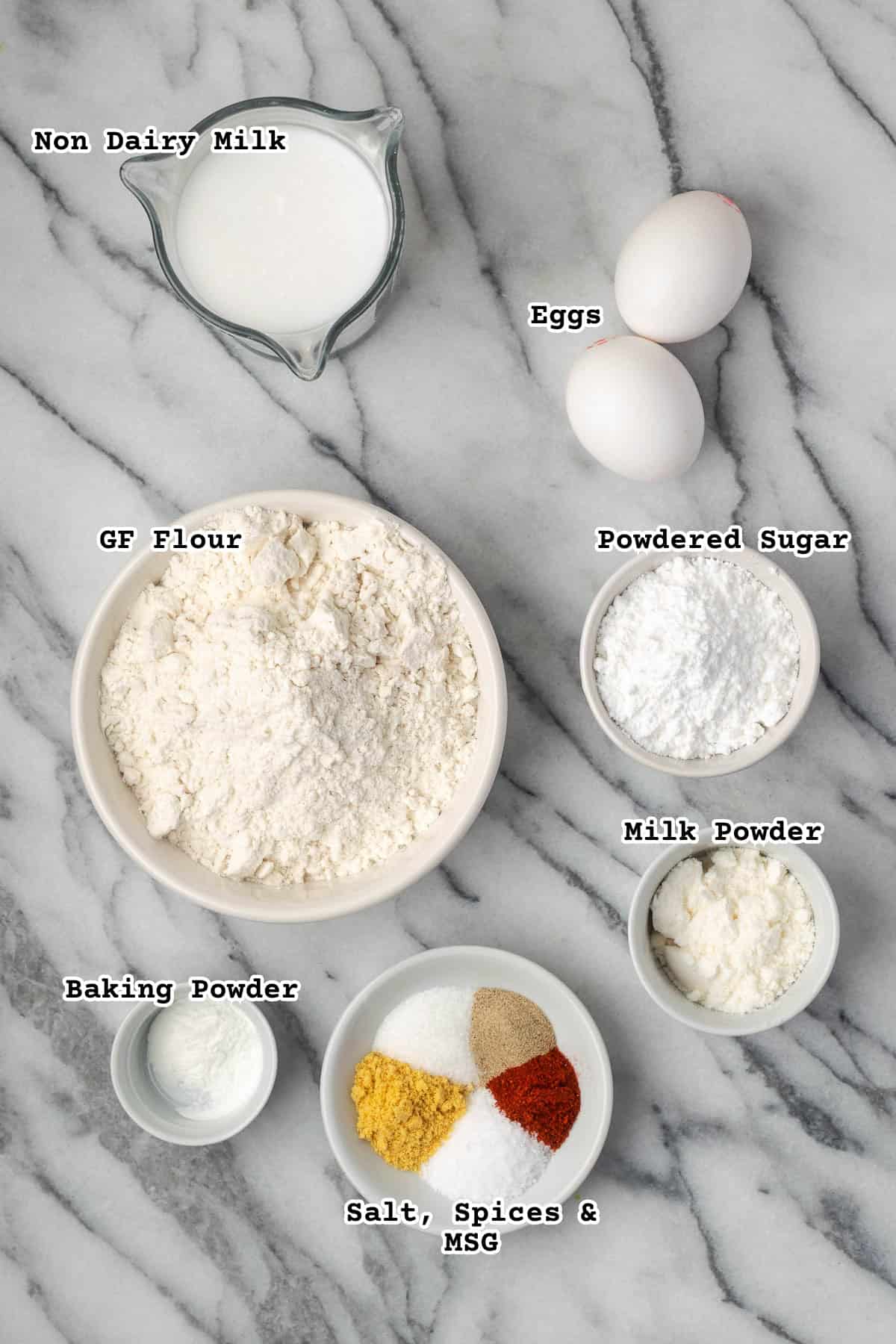 Ingredients for Chick Fil A breading on a marble counter.