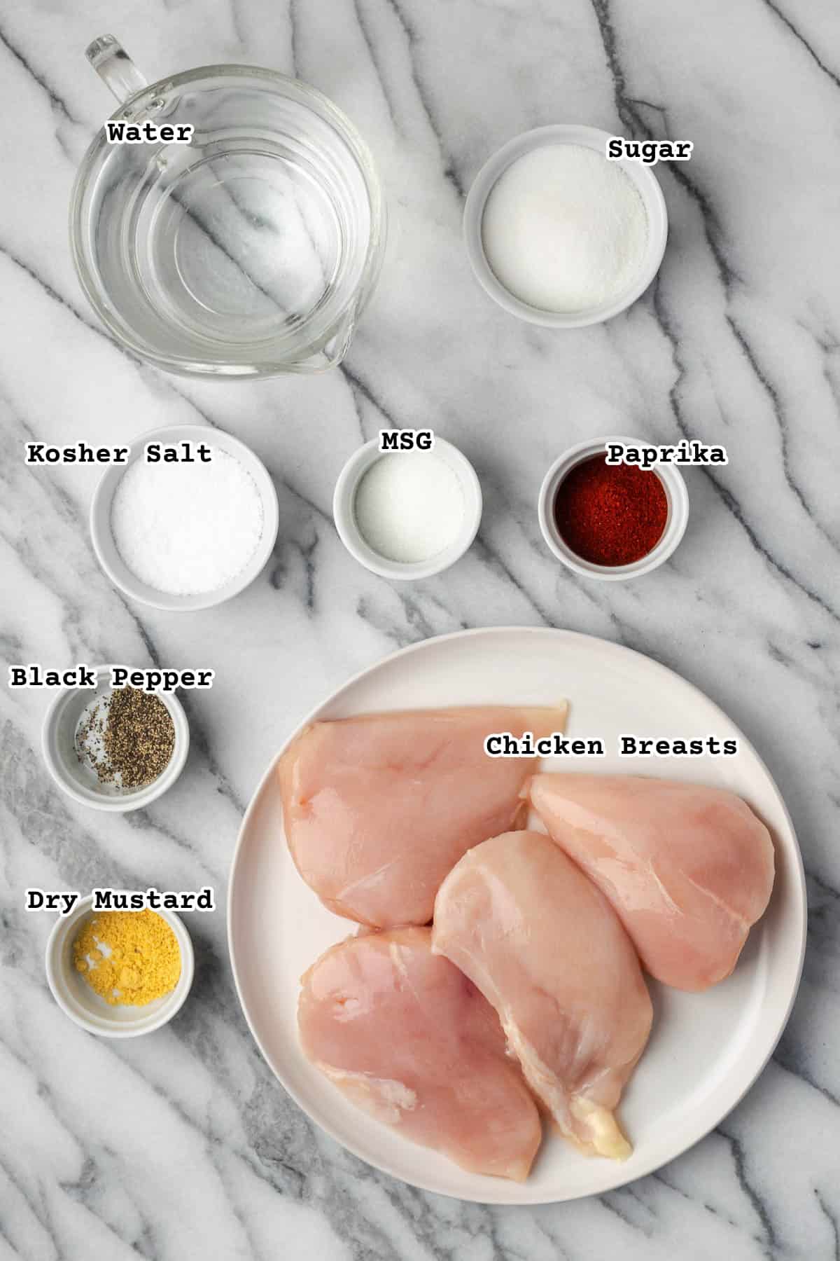 Ingredients for Chick Fil A chicken brine on a marble counter.
