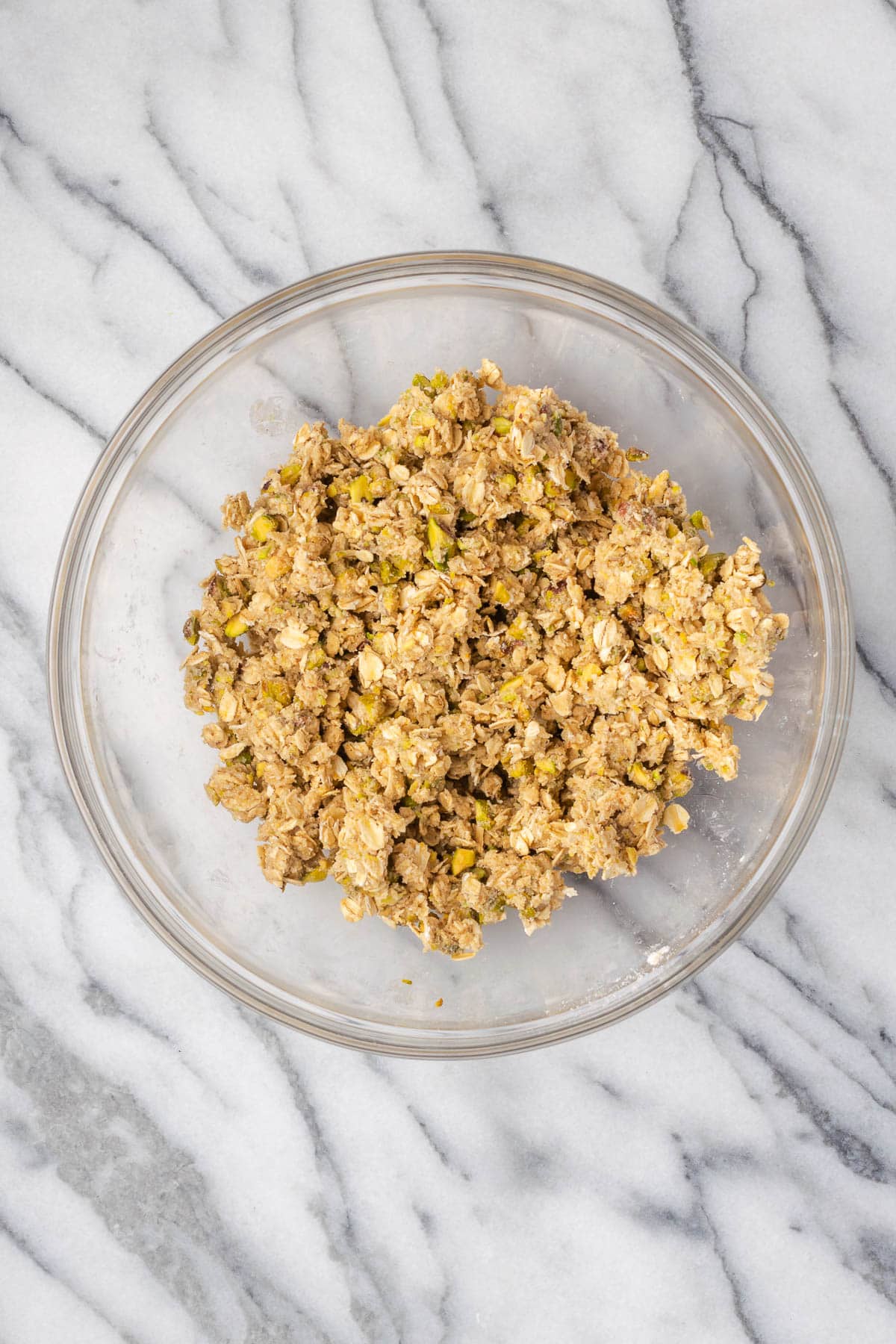 Oat crumble topping in a mixing bowl. 