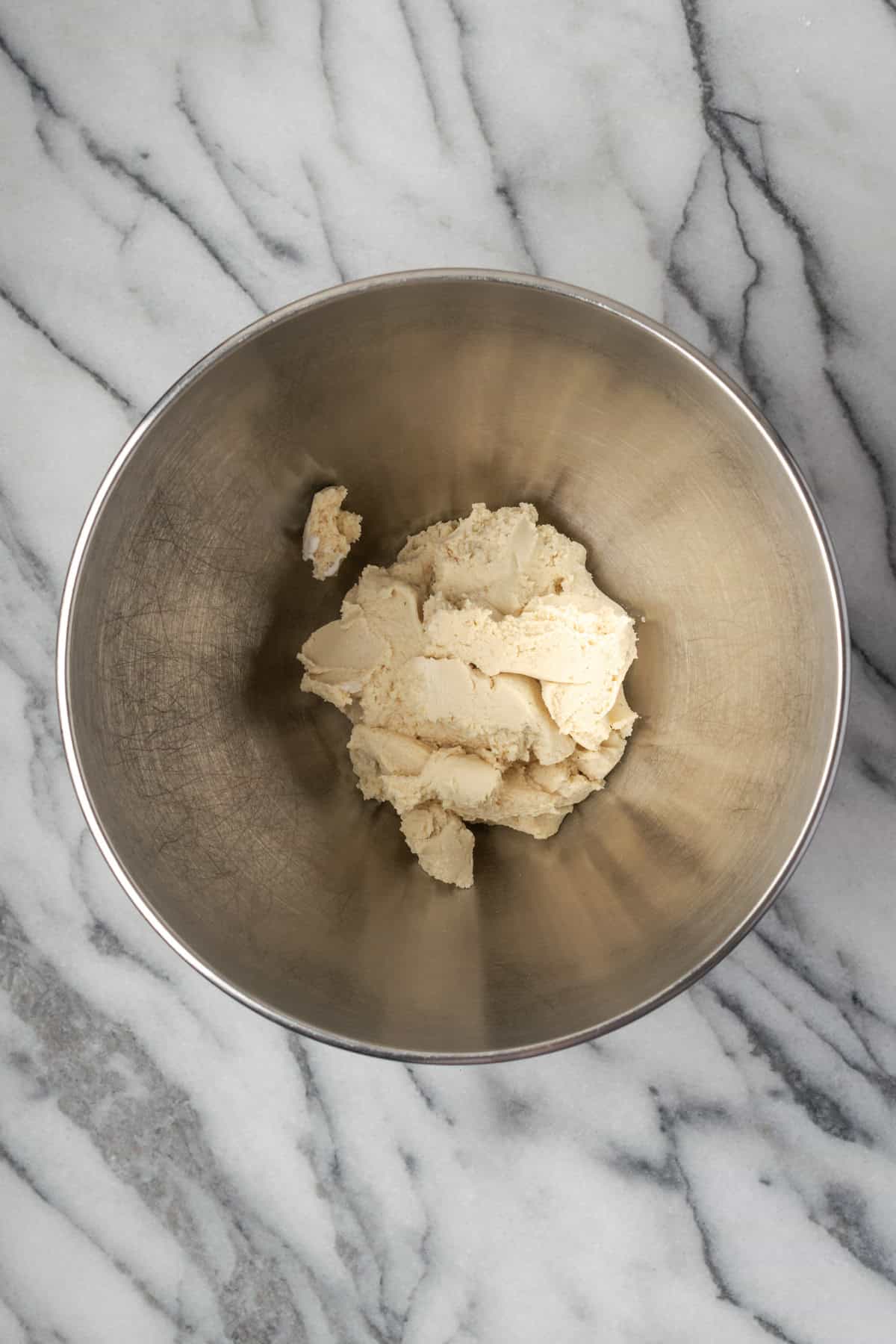 Cream cheese in a large mixing bowl. 