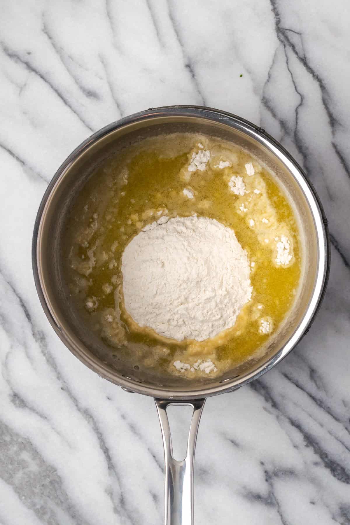 Melted butter and flour in a saucepan. 