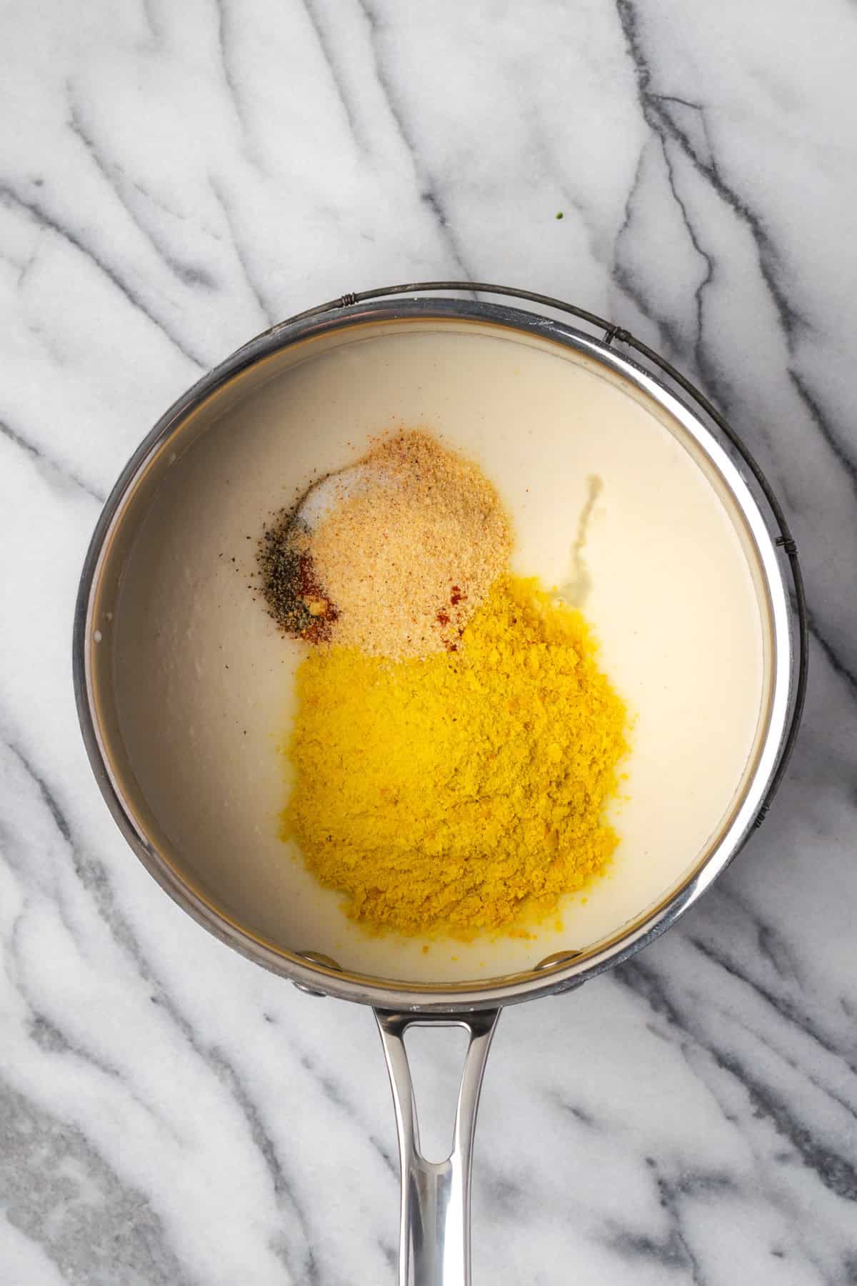 Nutritional yeast, spices and lemon juice added to the roux. 