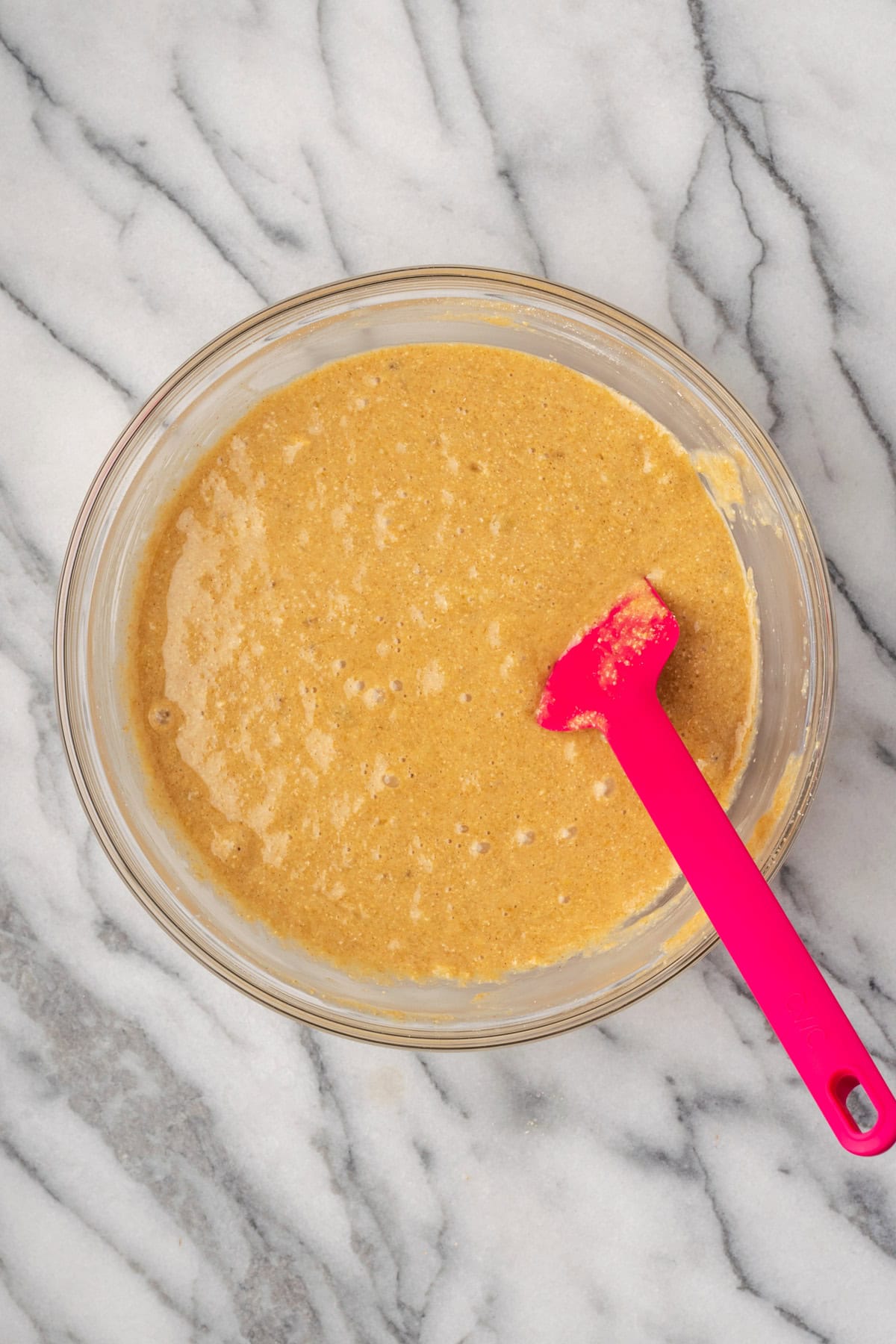 Muffin batter in a large mixing bowl.