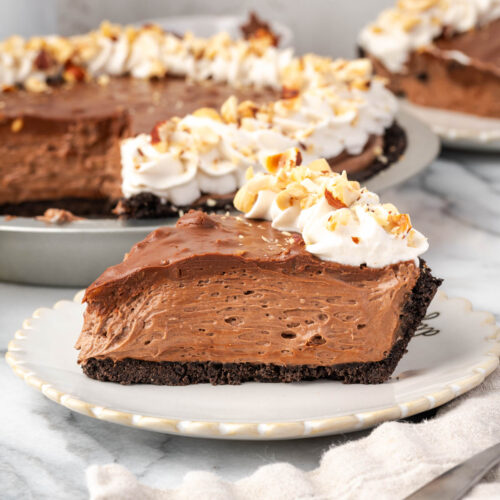 A slice of Nutella pie served on a small dessert plate.