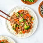 Ground turkey teriyaki with broccoli and carrots served over white rice.