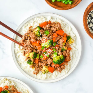Ground turkey teriyaki with broccoli and carrots served over white rice.