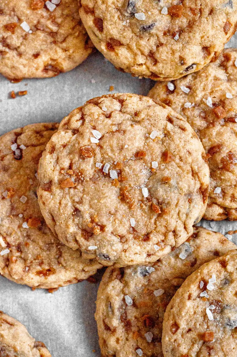 Several chocolate chip cookies filled with bits of toffee.